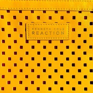 Yellow and pink Kenneth Cole Reaction wristlet!